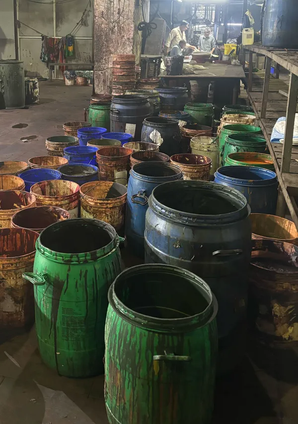 Dye and chemical drums at a process house